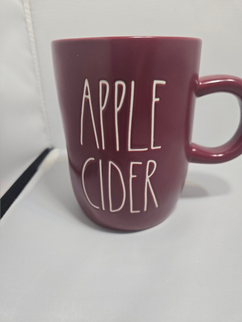 Rae Dunn's APPLE CIDER Mug In Burgundy.
